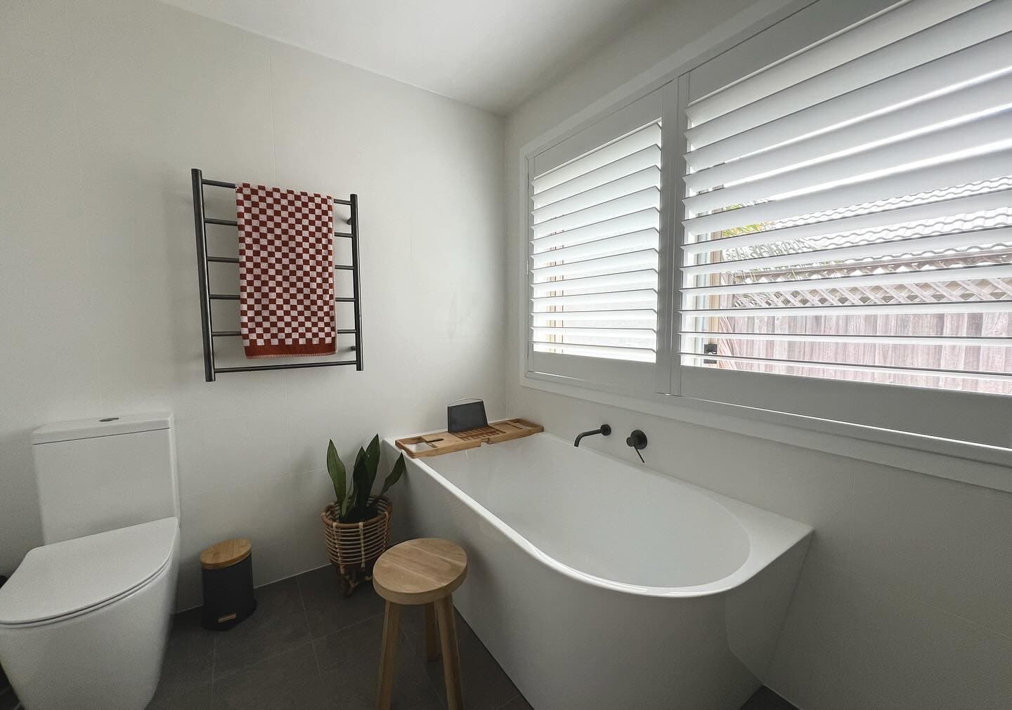 Bathroom — freestanding bath with plantation shutters